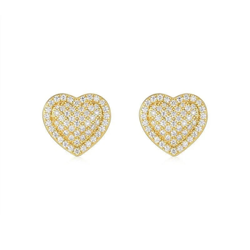 A pair of golden heart-shaped moissanite stud earrings on an S925 silver post.