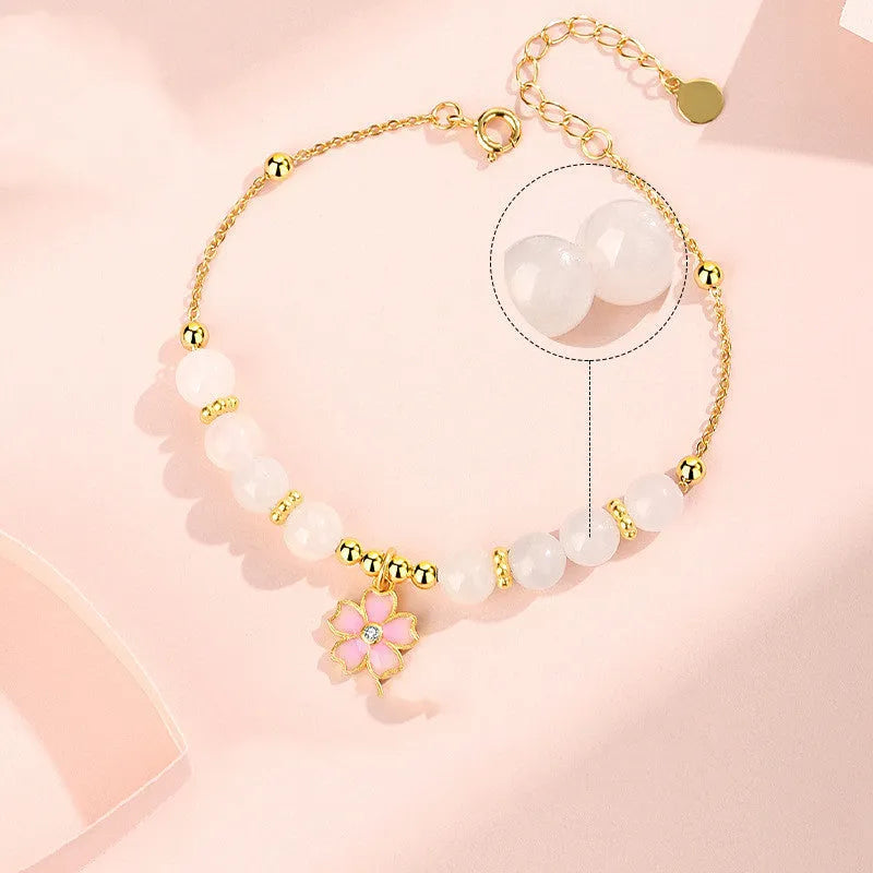 Women's silver bracelet with cherry blossom pendant and Hetian jade beads