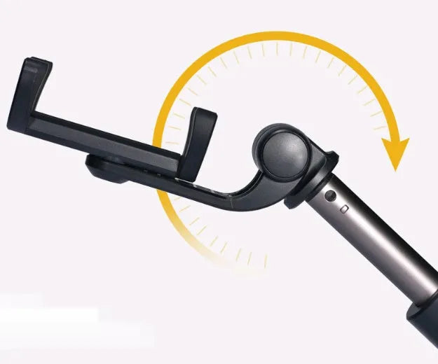 Aluminium alloy Bluetooth selfie stick with remote control and adjustable phone clip next to a smartphone
