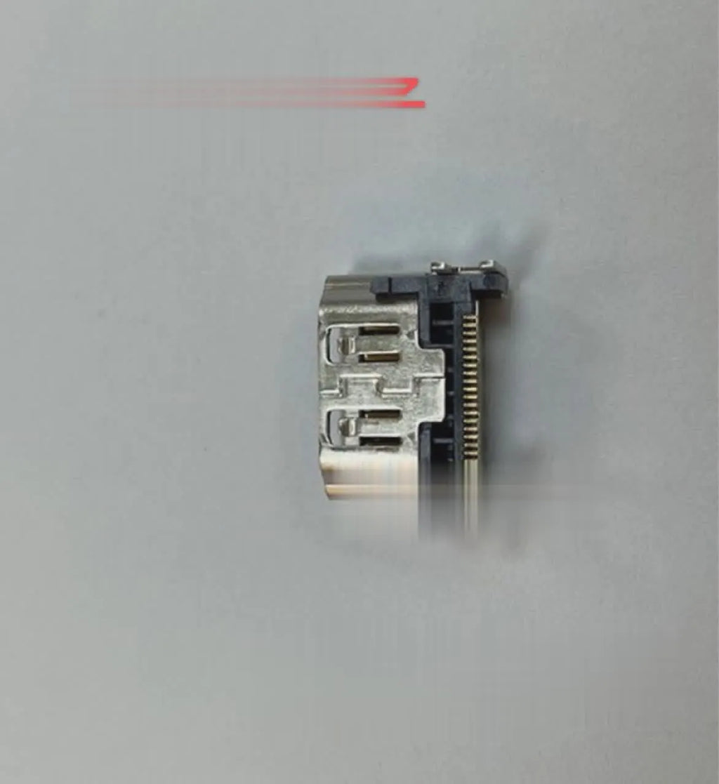 Silver HDMI host socket connector for game console repair.