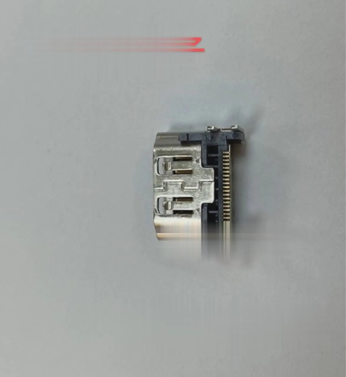 Silver HDMI host socket connector for game console repair.
