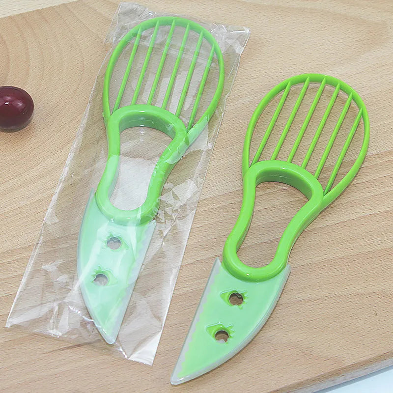 Multifunctional avocado knife in green and orange colours made of polypropylene
