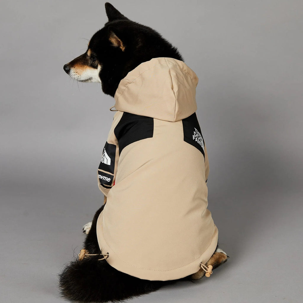 Khaki coloured polyester dog shell jacket shown on mannequin, back and side coverage design