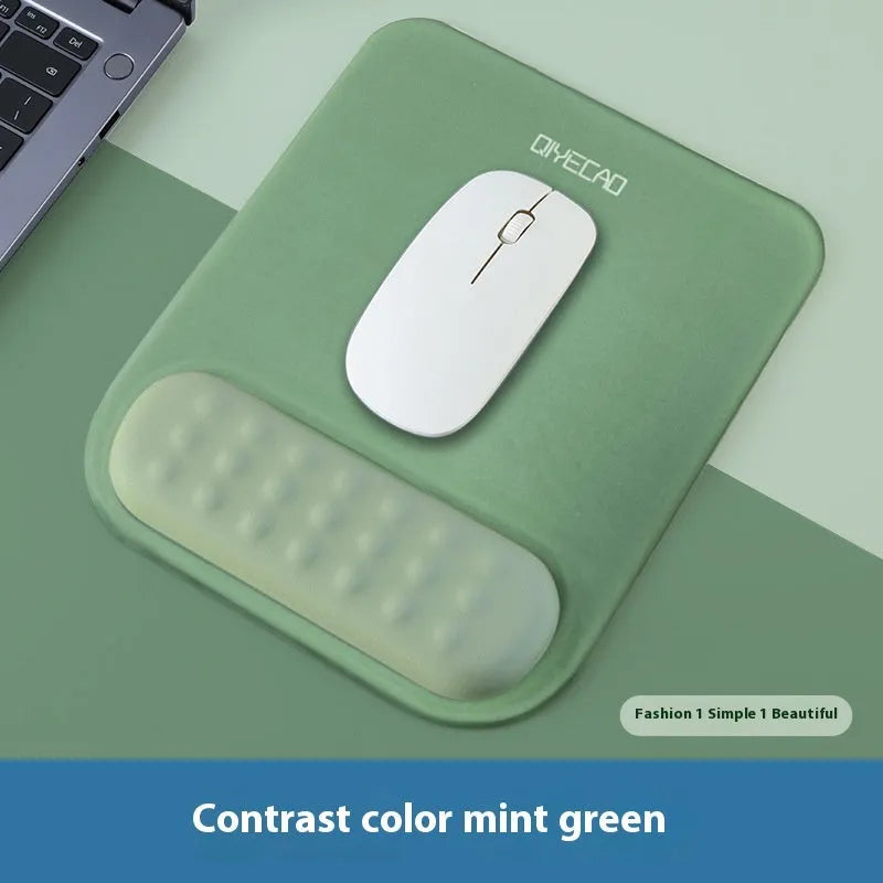 Ergonomic mouse pad with raised wrist support in a choice of contrast colour patterns on a desk.