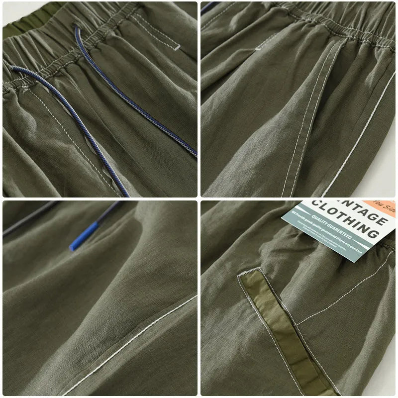 Man wearing loose green linen shorts with a drawstring waist and straight leg cut.