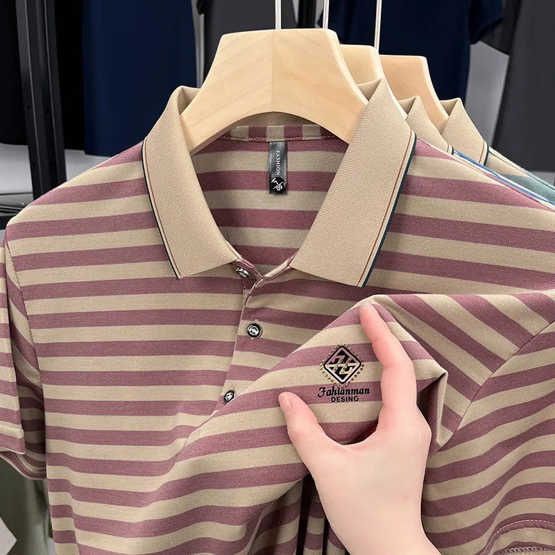 Man wearing a red striped short sleeve casual t-shirt with a mosaic pattern design.
