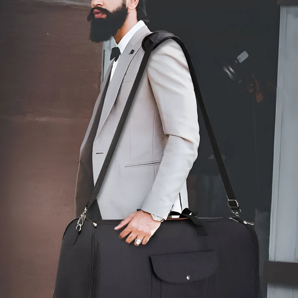 Folding duffel luggage bag in dark blue Oxford cloth with carrying handles.