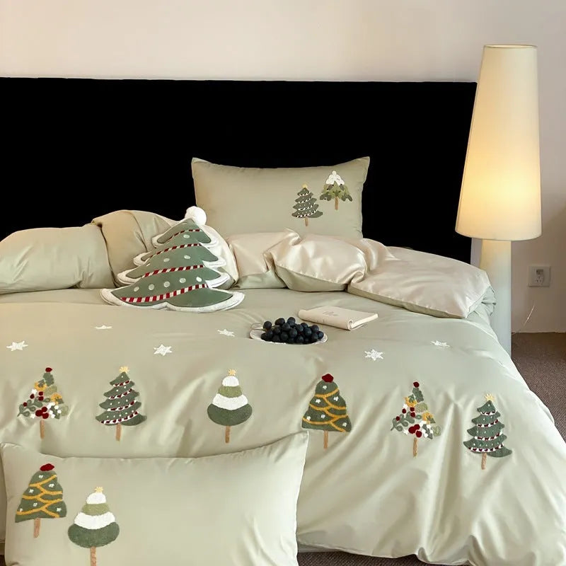 Cream blue cotton bedding set with embroidered Christmas tree and flowers on duvet cover.