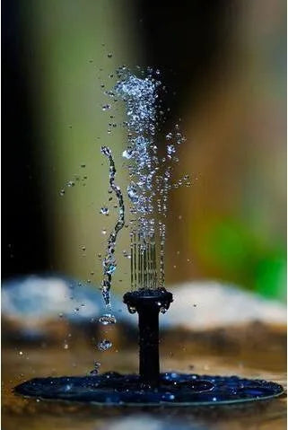 Black solar-powered garden fountain with four spray nozzles for bird baths and ponds