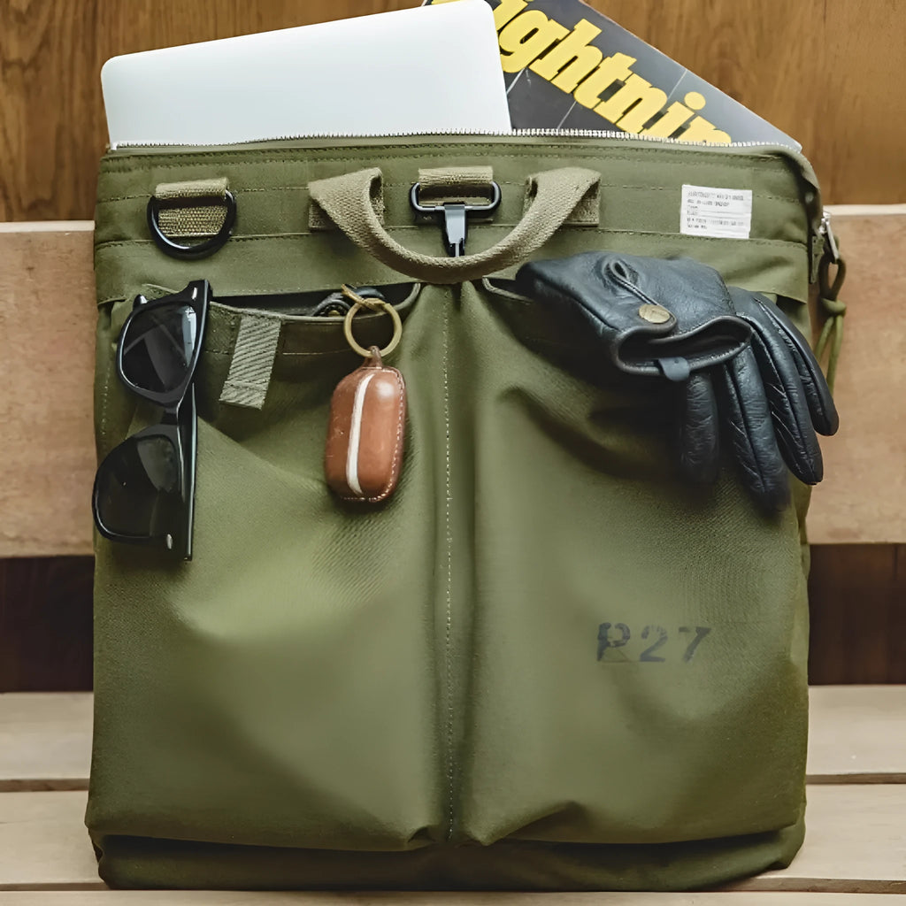Marden Tooling Helmet medium canvas messenger bag in charcoal black showing vertical square shape and shoulder strap
