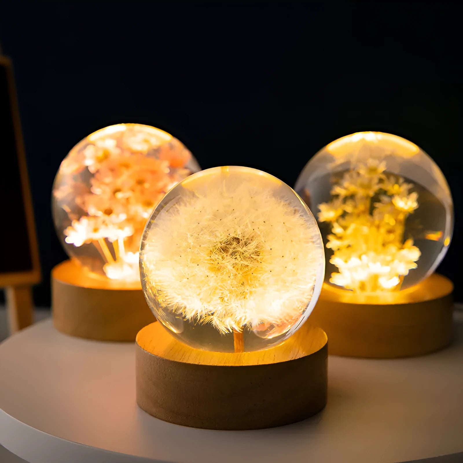 60mm dandelion crystal ball ornament with LED light on a beech wood desktop stand.