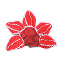 Medium dog wearing Halloween costume with demon hat flower headband and chomper style top