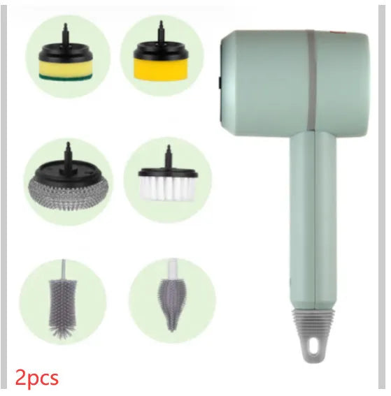White rechargeable electric cleaning brush with multiple scrubber heads on a kitchen worktop.