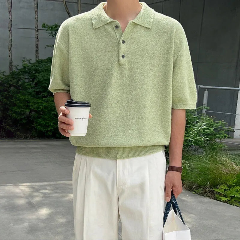 Retro-style men's caramel coloured knitted polo shirt with short sleeves and an asymmetric design detail.