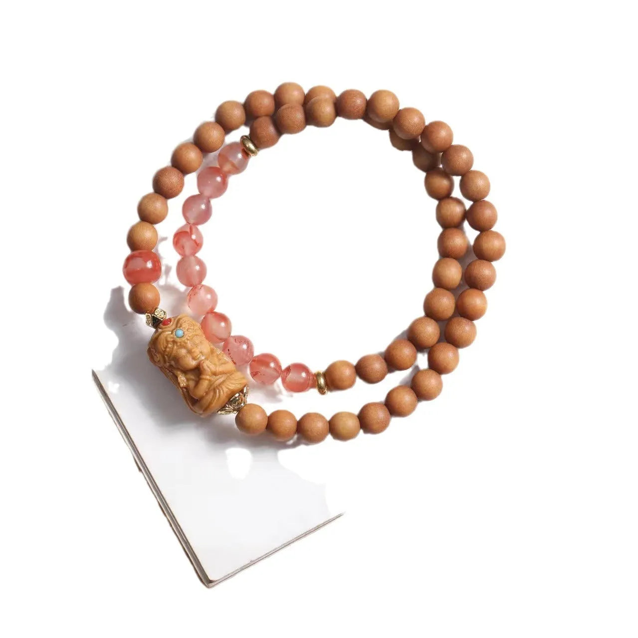 Brown sandalwood bracelet with woven South Red Zachilam design and 6mm round beads