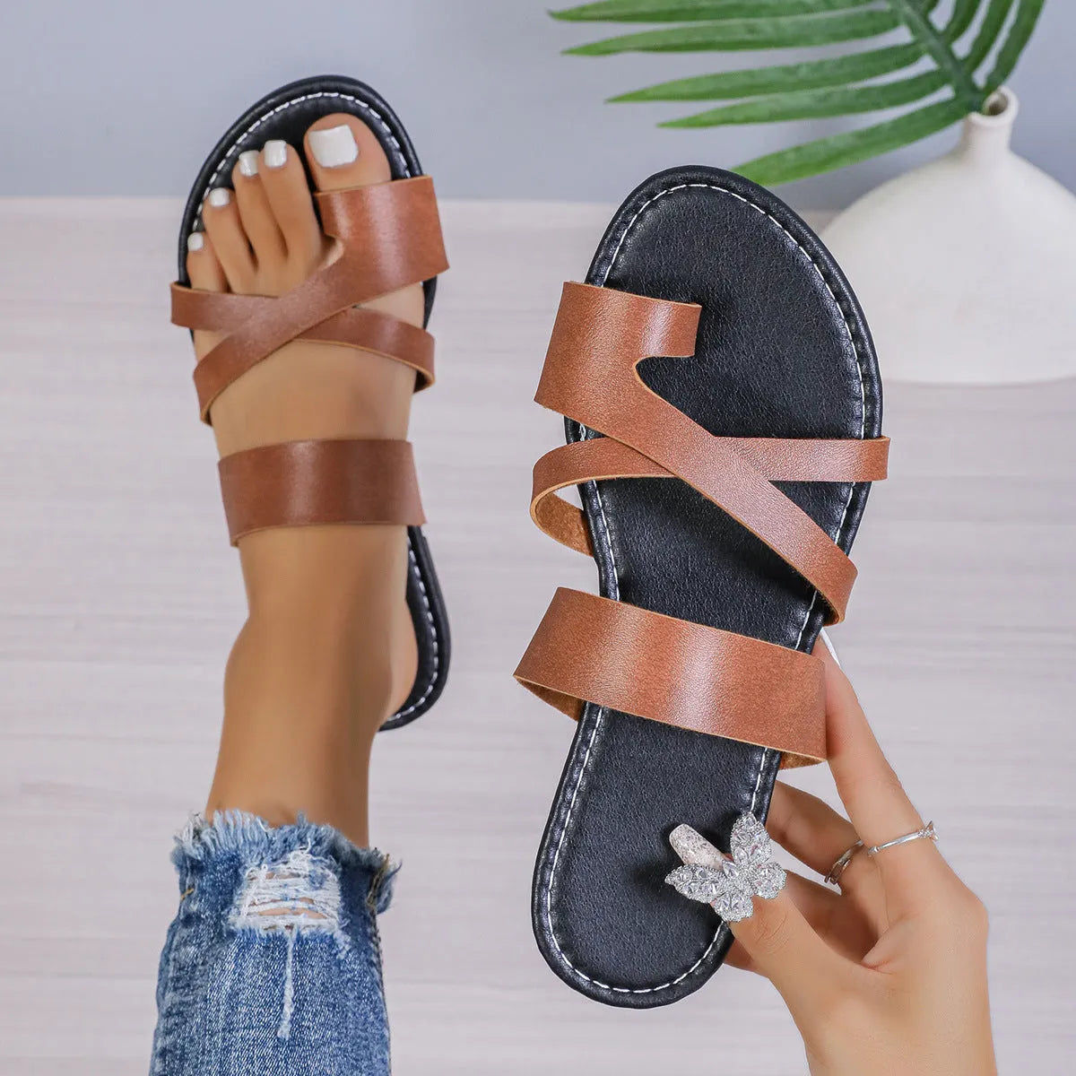 Solid colour round toe beach slippers with a one-strap design and perforated hollow out details on the sole.