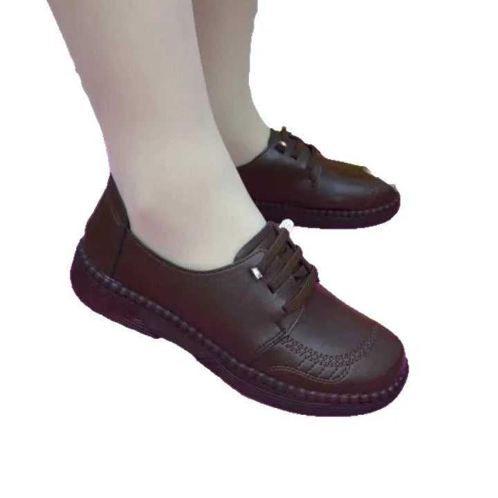 Soft leather women's low heel shoes in black, breathable PU upper, lace-up design