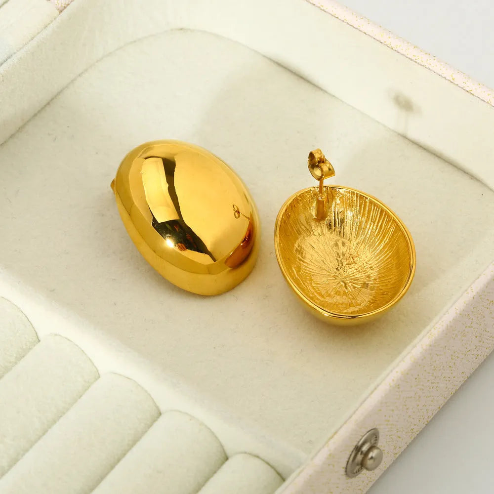 Geometric stainless steel ear studs with electroplated 18K gold finish and glazed surface in colour DFE139