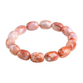 Natural cherry agate barrel bead bracelet with 10x14mm stones and Ruyi design elements