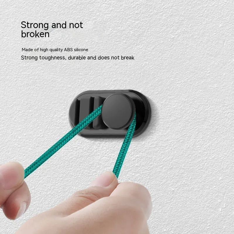 Dark green ABS plastic car storage hook with silicone pad for holding cables
