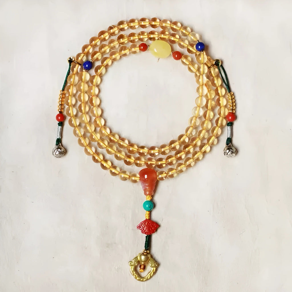 Natural Brazilian citrine bracelet with small 1mm red and yellow beads and filament accessories.