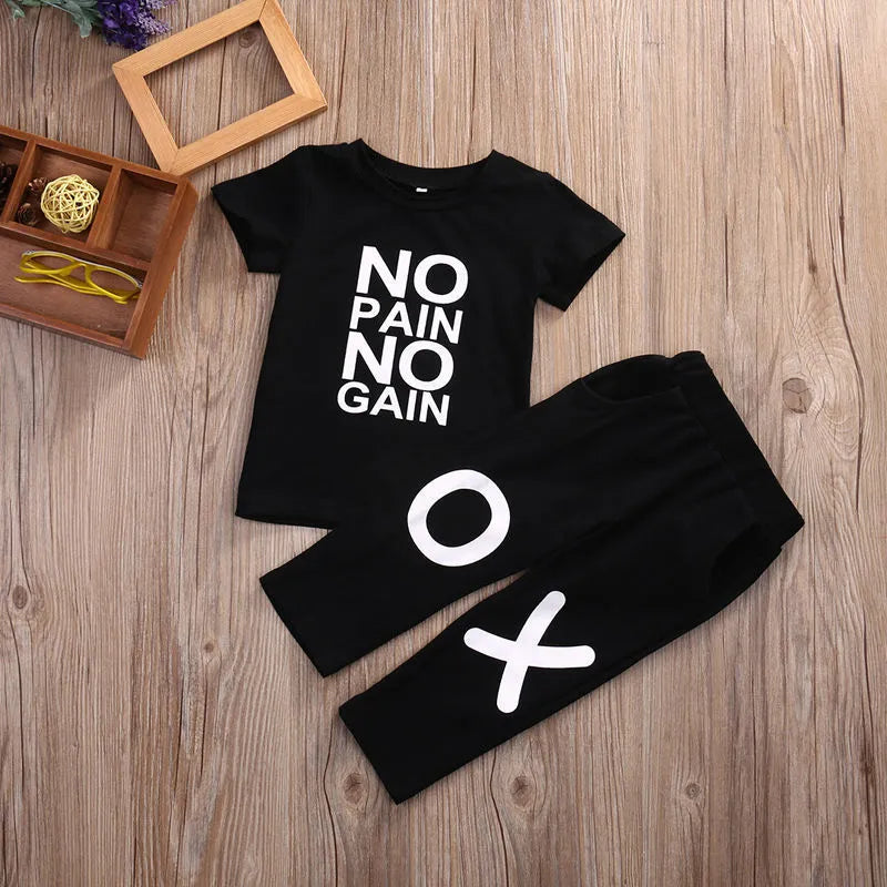 Black summer children's cotton short sleeve two-piece set on a white background