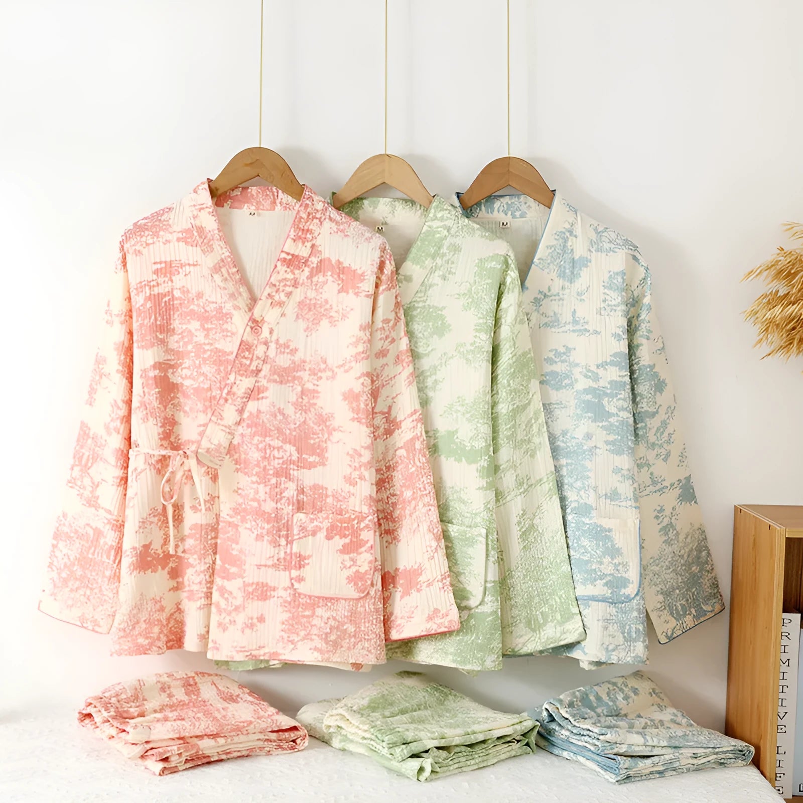 Women's pink pure cotton gauze lounge suit with lace-up detail and long sleeves, shown with matching trousers