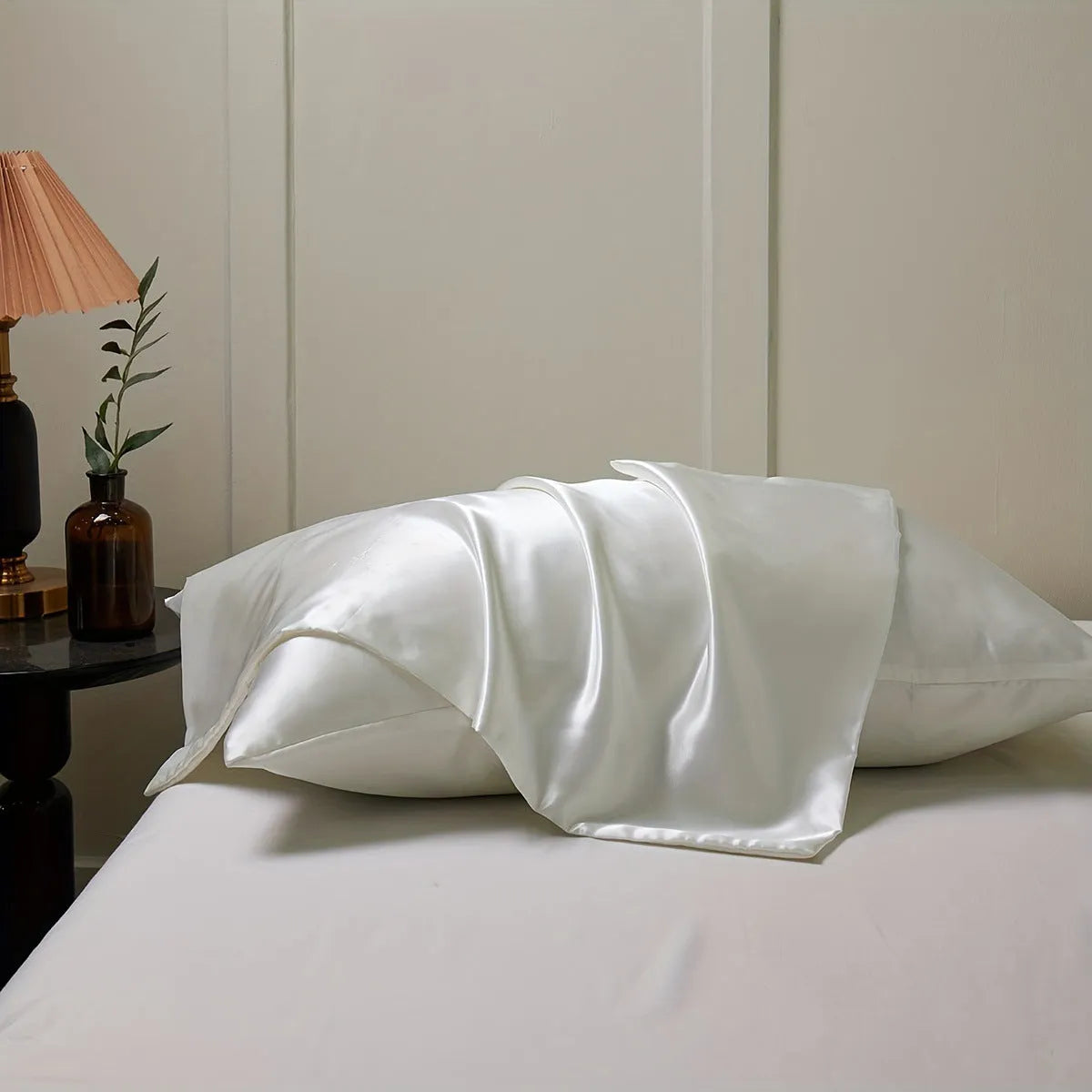 Satin polyester pillowcase pair in solid colour with plain weave texture