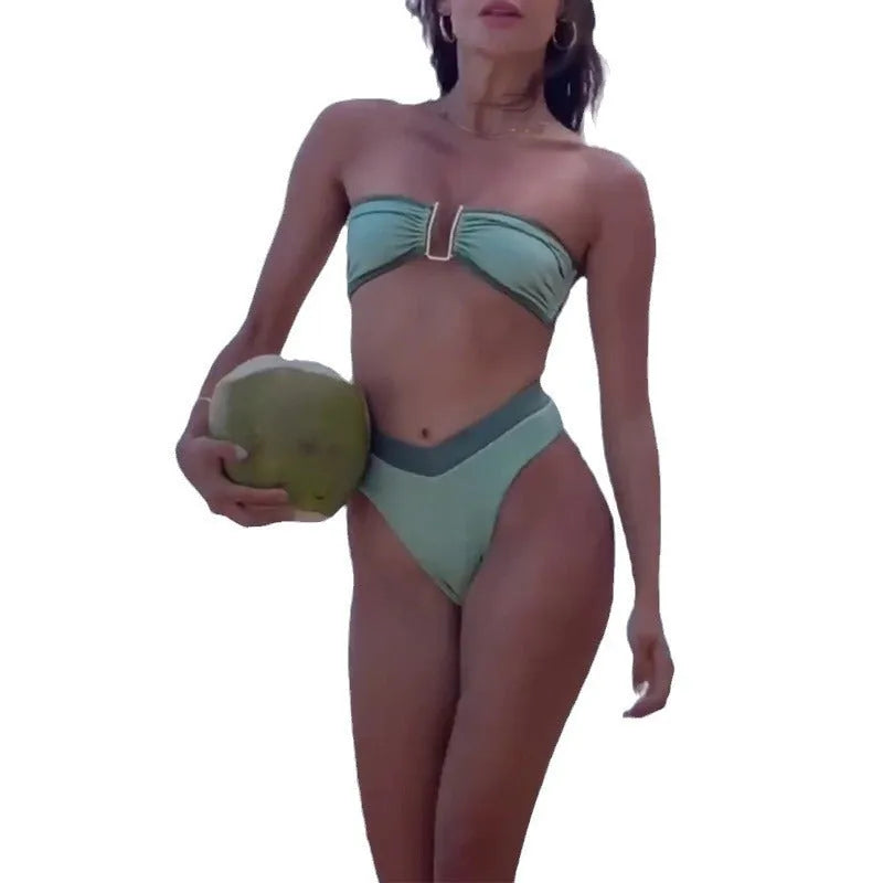 Women's fluorescent green nylon bikini swimsuit with contrast colour detailing.
