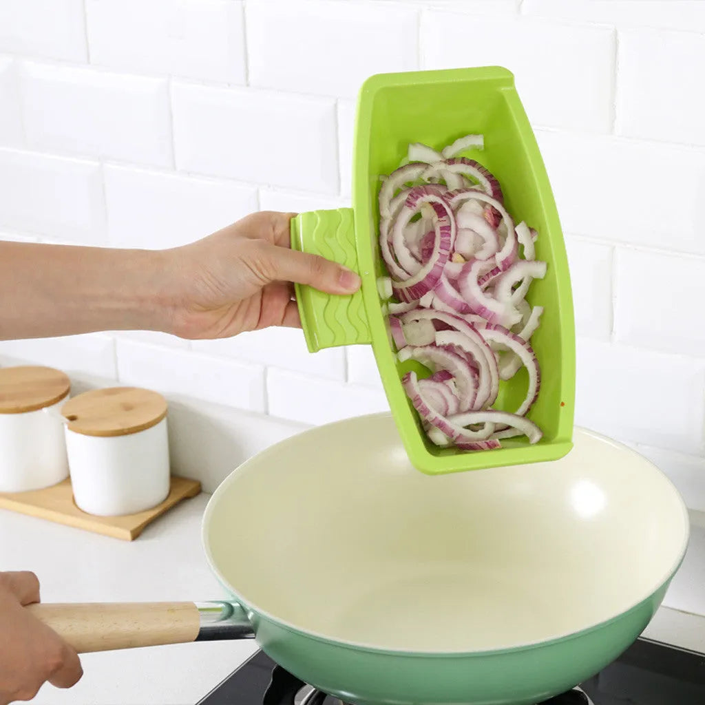 Green multi-function cutting board with sink basket mounted on kitchen sink edge
