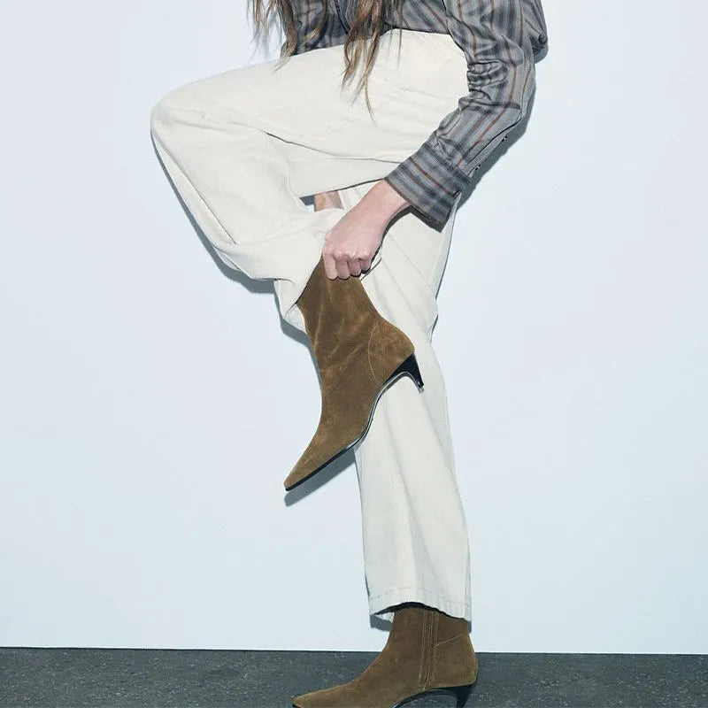 Women's brown square toe ankle boots with a side zipper and a mid kitten heel on a waterproof platform.