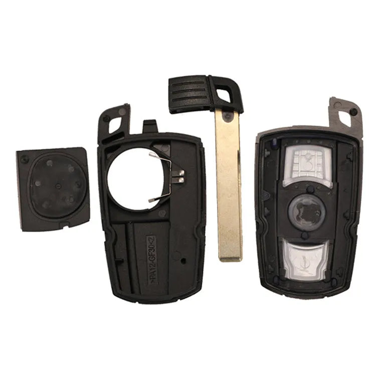 BMW semi-intelligent remote car key fob with three buttons, metal and plastic construction.