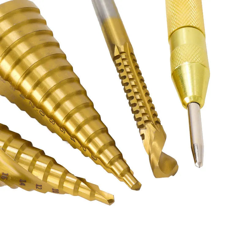 High speed steel step drill bits and a centre punch arranged as a set for hole enlargement.