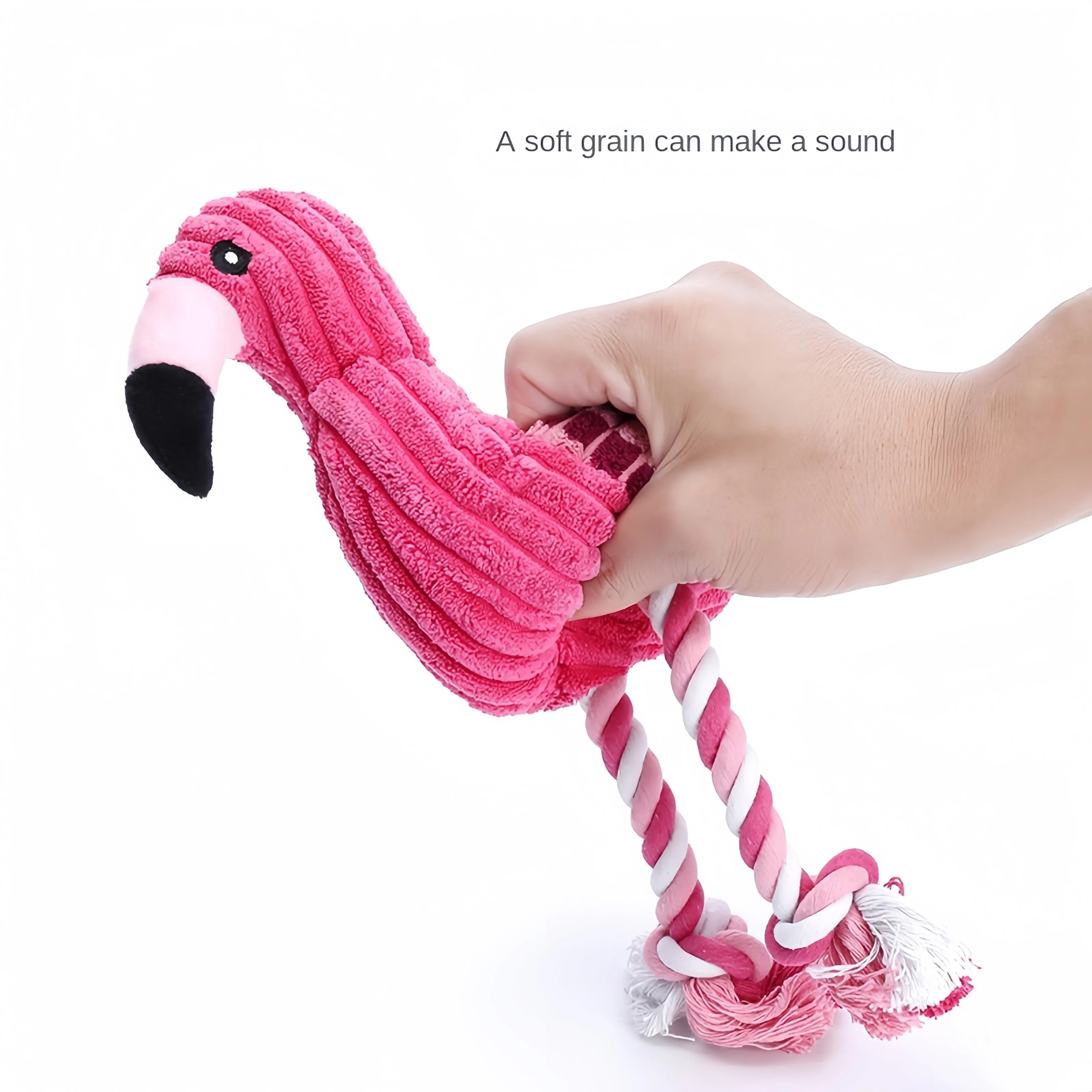 Pink animal-shaped corduroy plush dog squeaky toy for chewing play.
