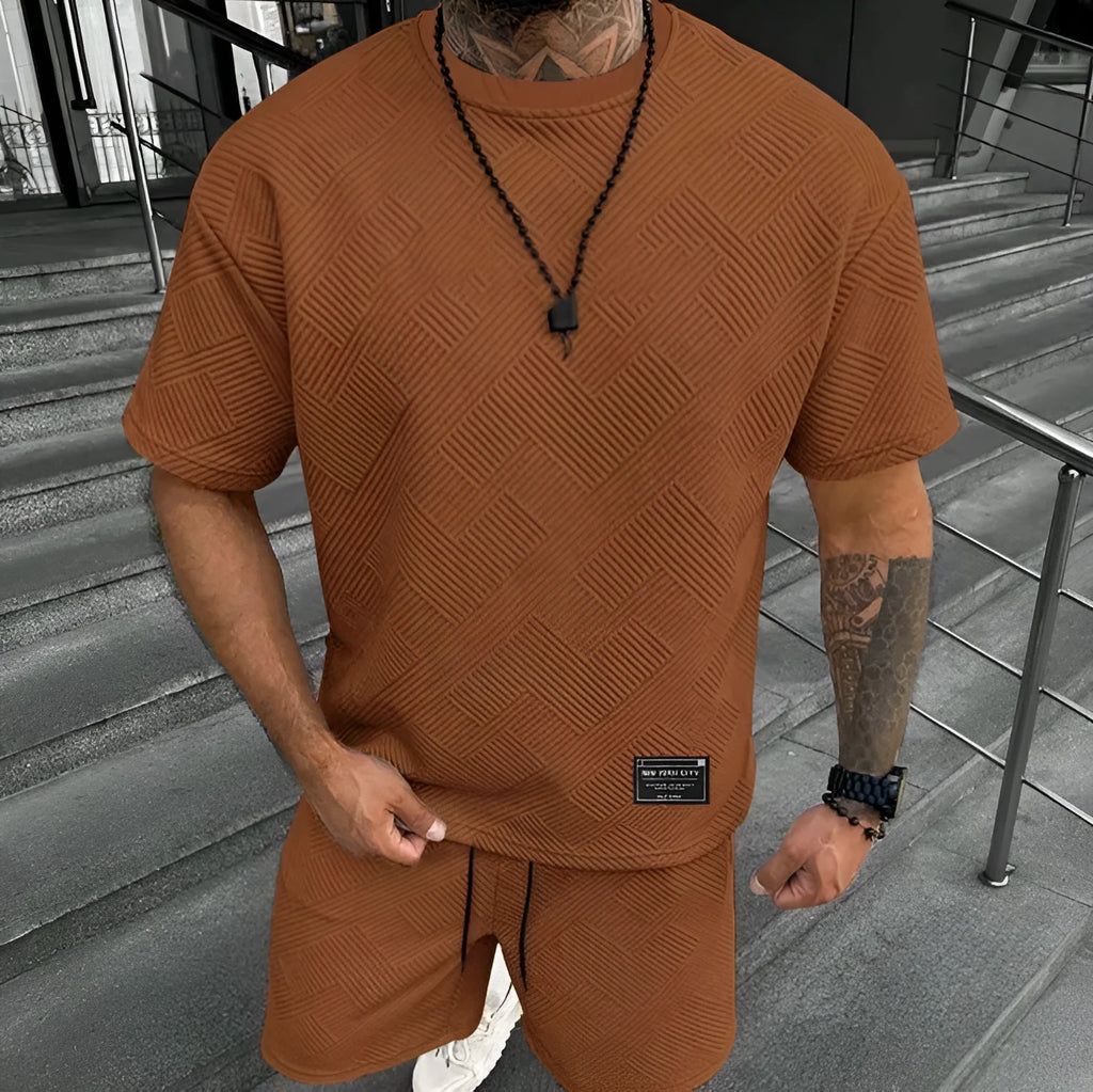 Men's short sleeve top and shorts suit in a polyester blend fabric on a mannequin