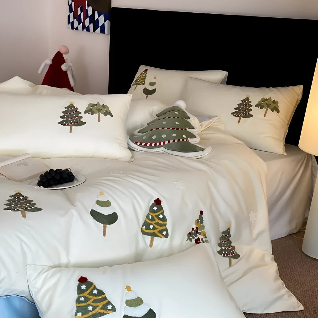 Cream blue cotton bedding set with embroidered Christmas tree and flowers on duvet cover.