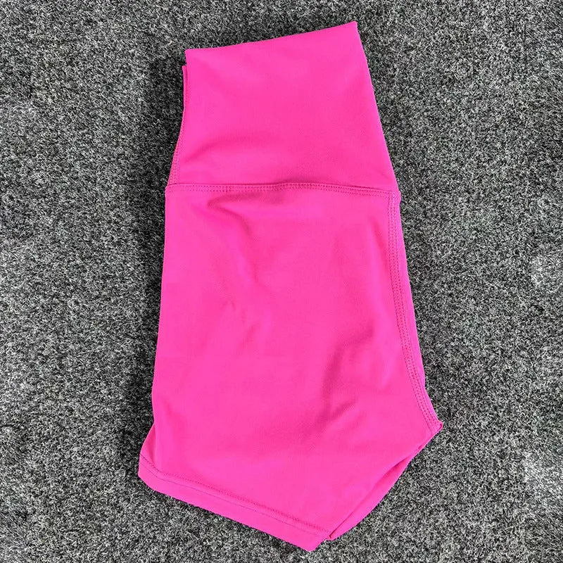 High-waisted yoga shorts for women in nylon fabric, shown in one of 15 available colours.