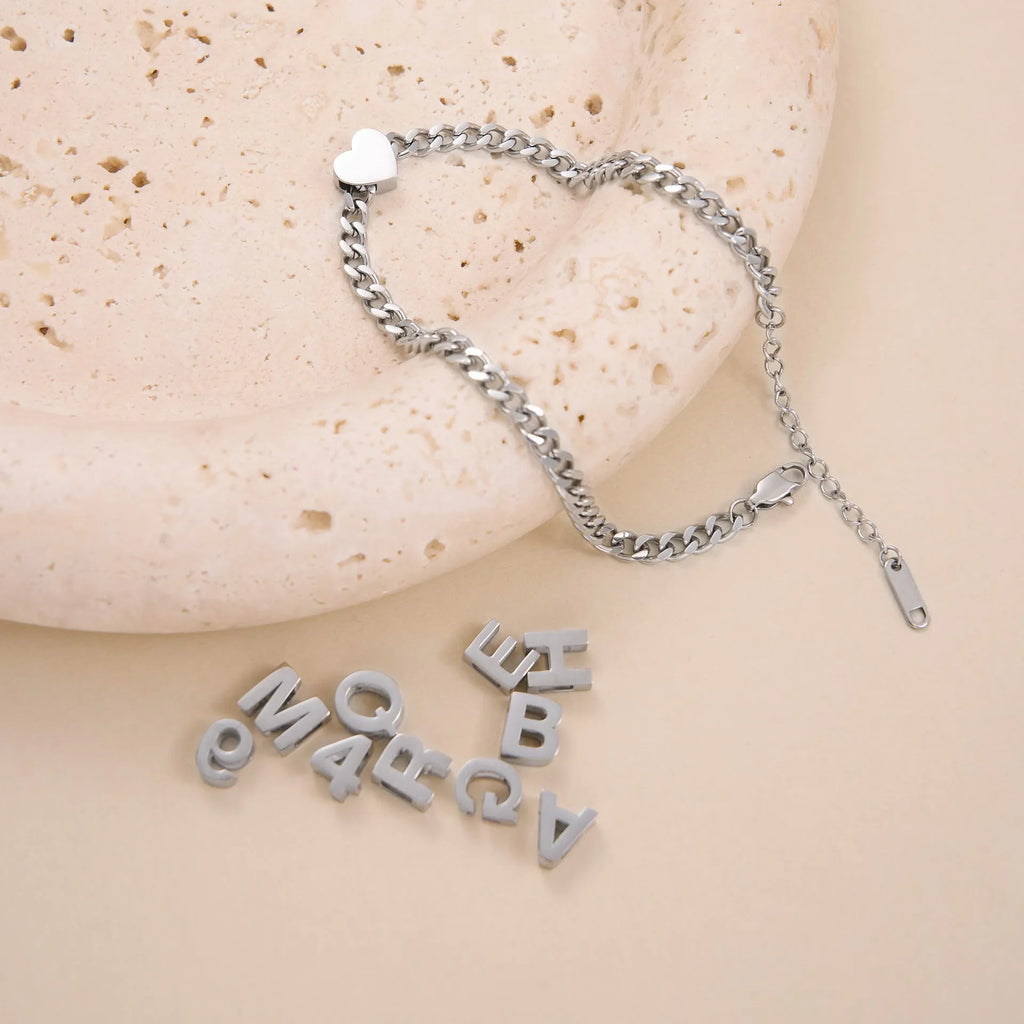 Gold electroplated titanium steel necklace with letter A pendant on a 40cm blade chain