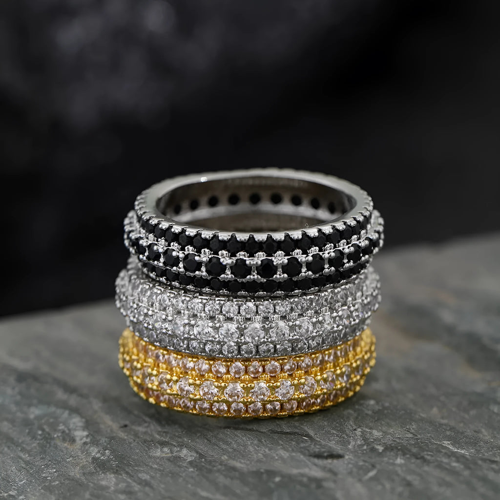 Personalised geometric ring with triangle zircon inlay in white gold finish on a hand.