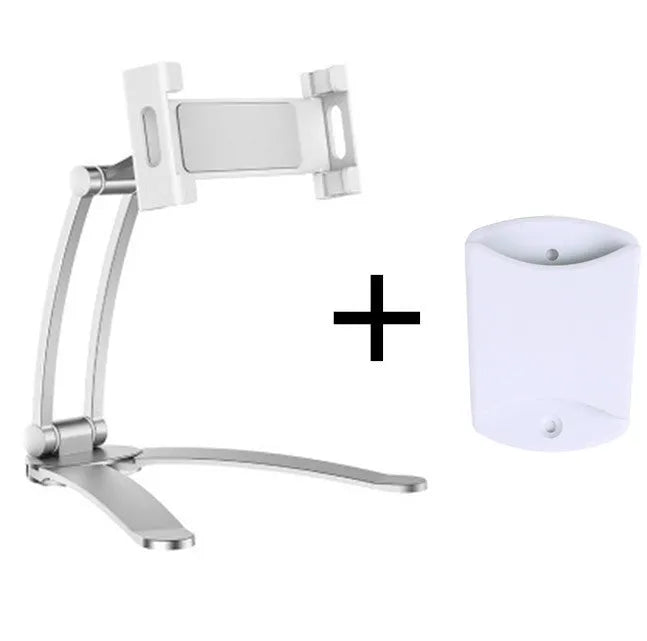 Silver aluminium alloy desktop tablet stand holding a tablet, showing 360-degree adjustable arm and mounting base.