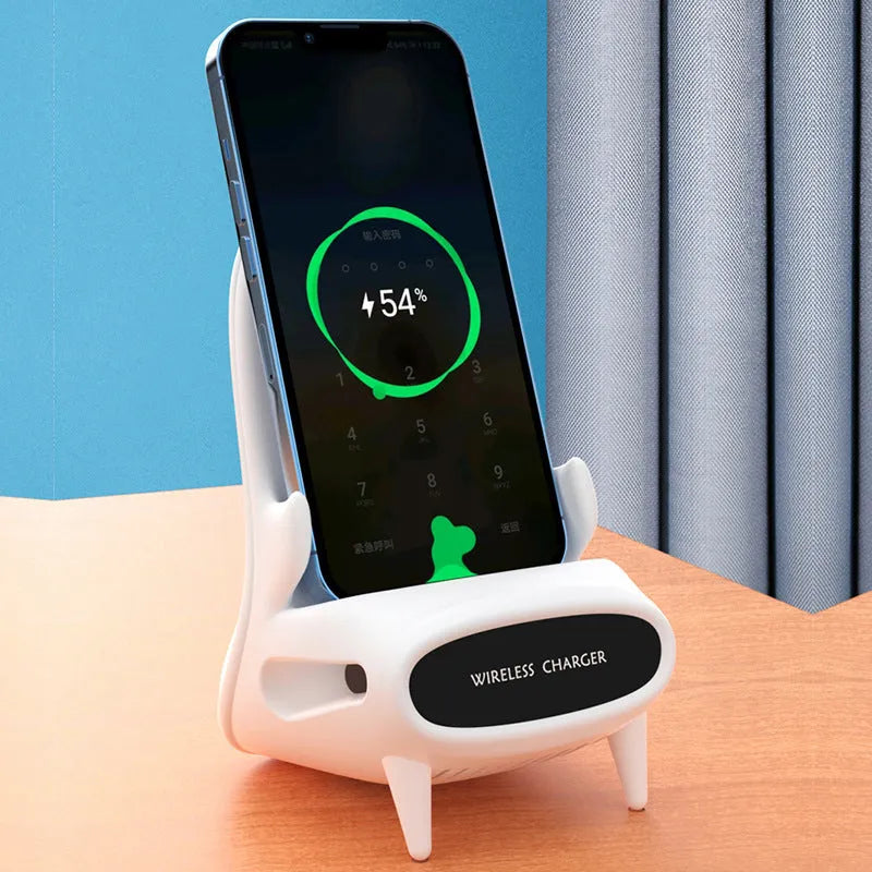 White mini chair shaped wireless charging stand holding a mobile phone at an angle