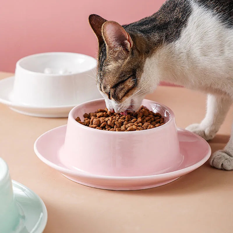 Green ceramic slow feeder pet bowl with anti-choke basin and neck protection design.