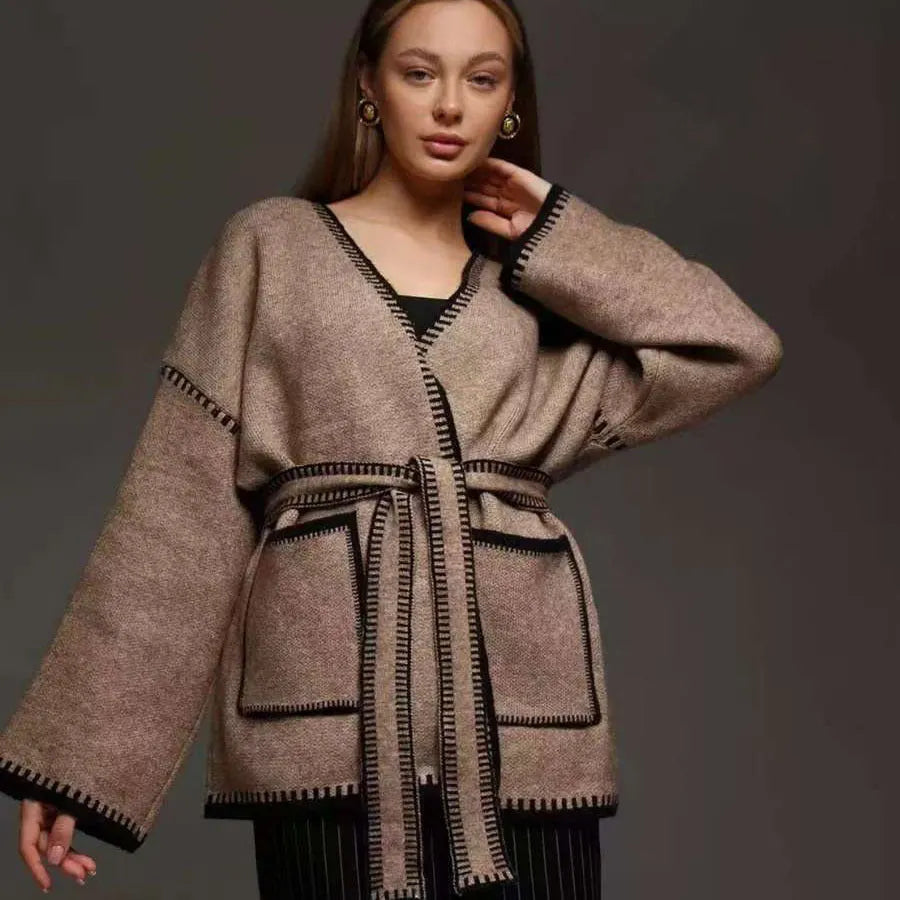 Loose fit knitted cardigan coat in imitation cashmere fabric showing front cardigan styling and long sleeves