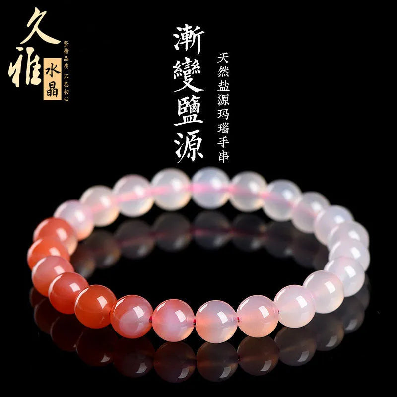 Yanyuan Agate bracelet with gradient salt source colour on wrist, showing geometry-shaped beads.
