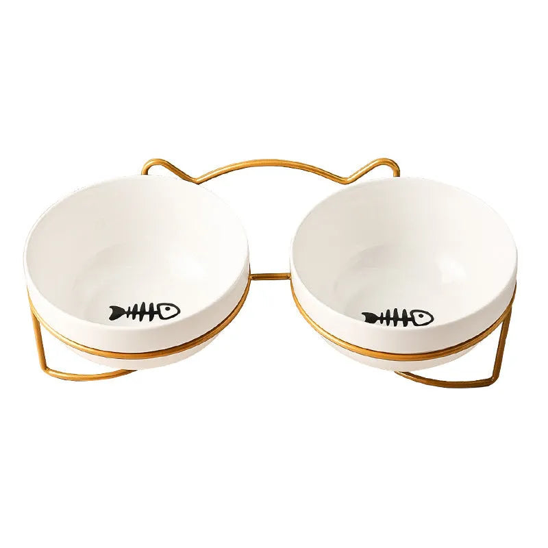 White ceramic cat bowl with cat paw pattern and black iron frame with cat ears