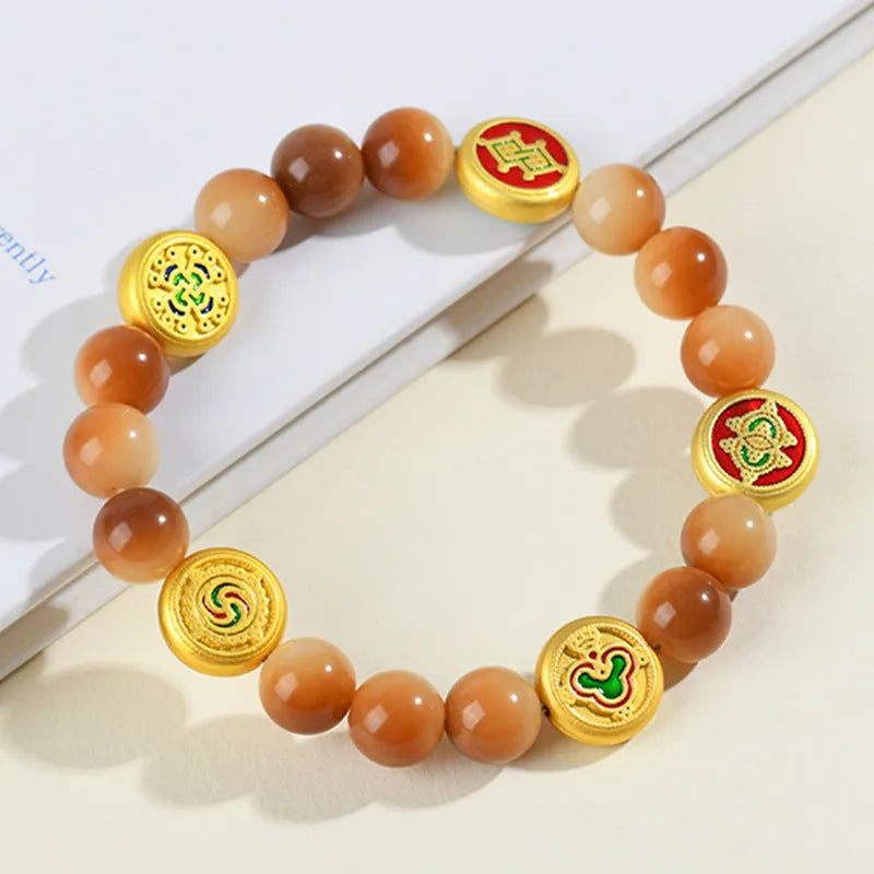 Yellow Bodhi seed bracelet showing five directions geometric design with round beads