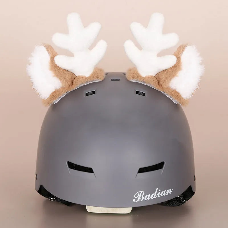 Plush cartoon-themed cover set on a medium motorcycle helmet with soft ear decorations.