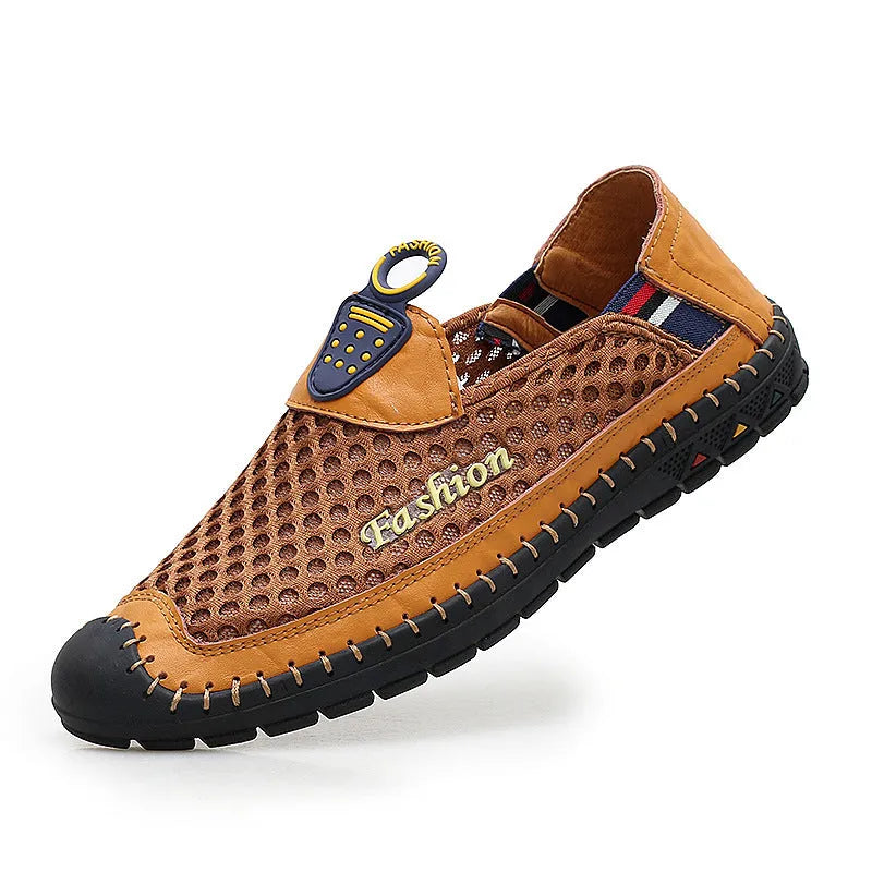 Men's brown casual shoes with mesh upper and rubber sole on a light background.