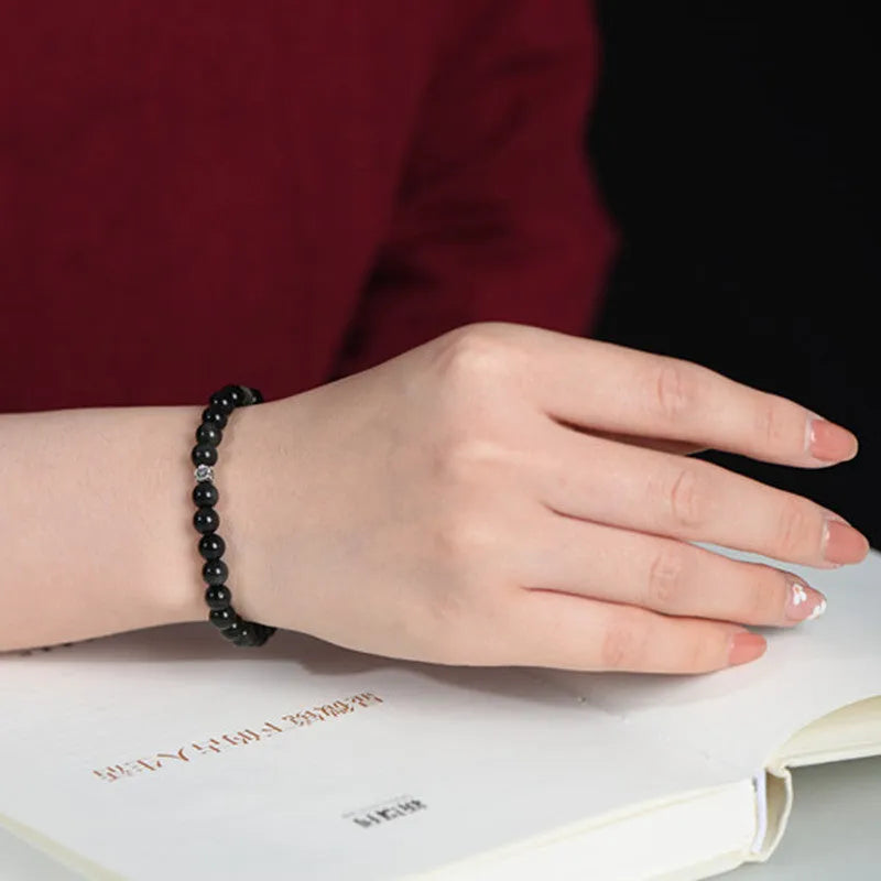 Natural obsidian bracelet with S925 silver small flower accessories featuring dragon phoenix decorations