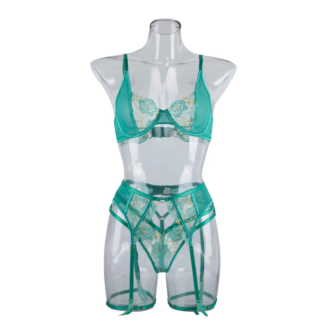 Light green women's embroidered bra set with three-point style and tights on a mannequin.